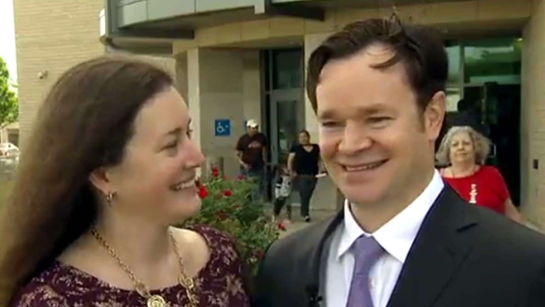 A Texas couple got married outside a sub-courthouse in Arlington after it was evacuated over a suspicious package.