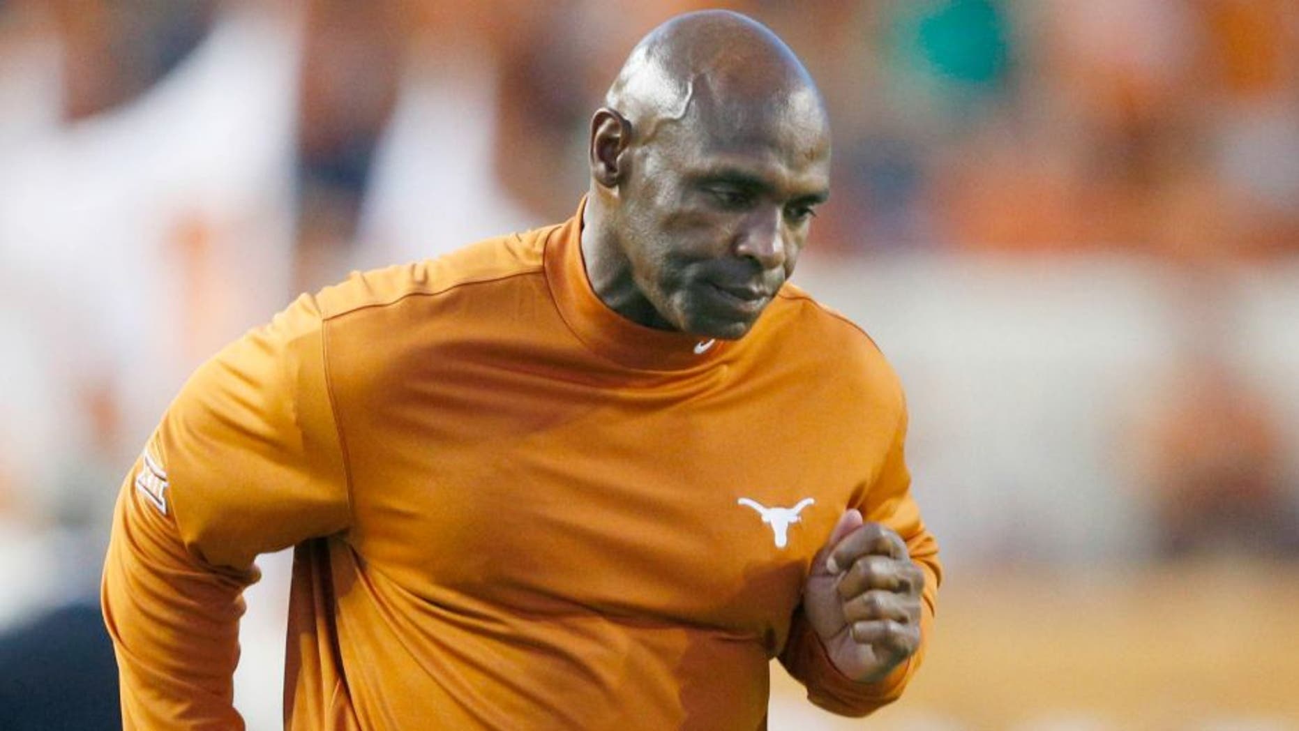 Sep 10, 2016; Austin, TX, USA; Texas Longhorns head coach Charlie Strong runs off the field at the end of the first half against the University of Texas at El Paso Miners at Darrell K Royal-Texas Memorial Stadium. Mandatory Credit: Erich Schlegel-USA TODAY Sports