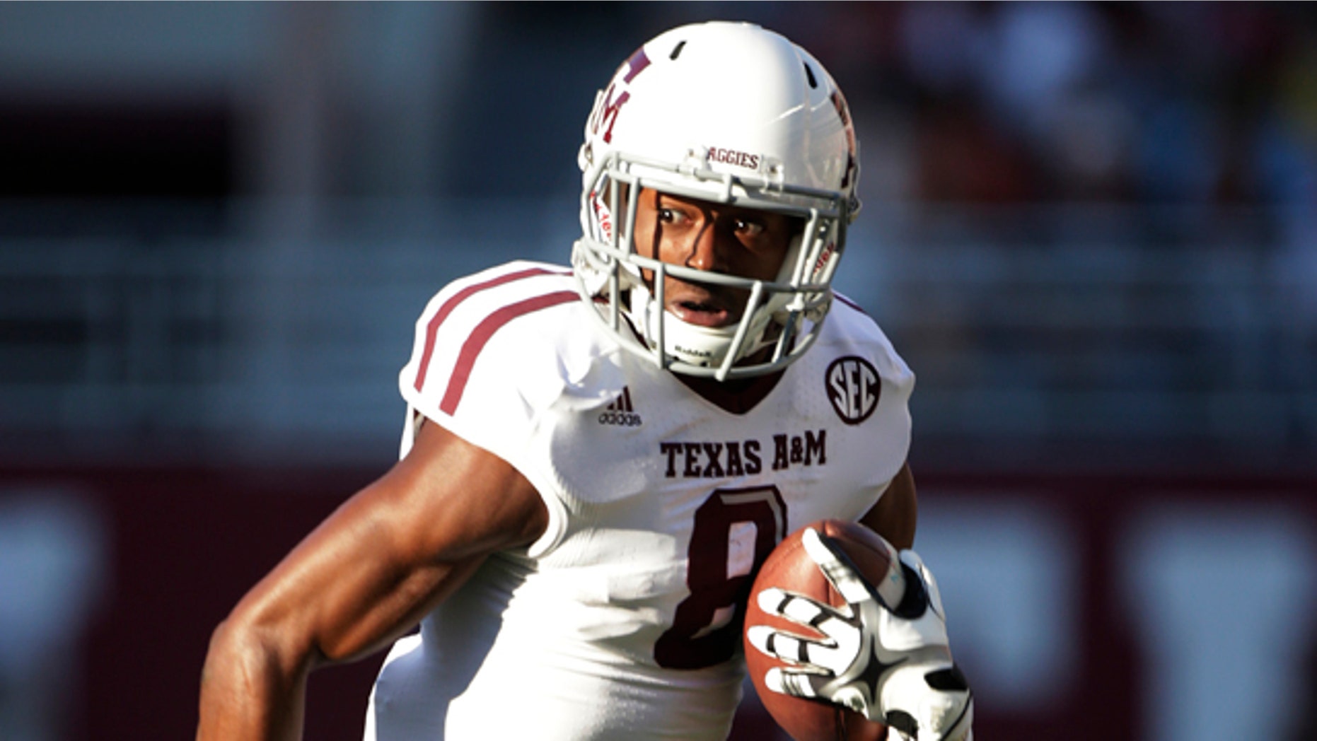 Nov. 10, 2012: In this file photo, Texas A&M wide receiver Thomas Johnson (8) carries for extra yardage after a reception during an NCAA college football game in Tuscaloosa, Ala.
