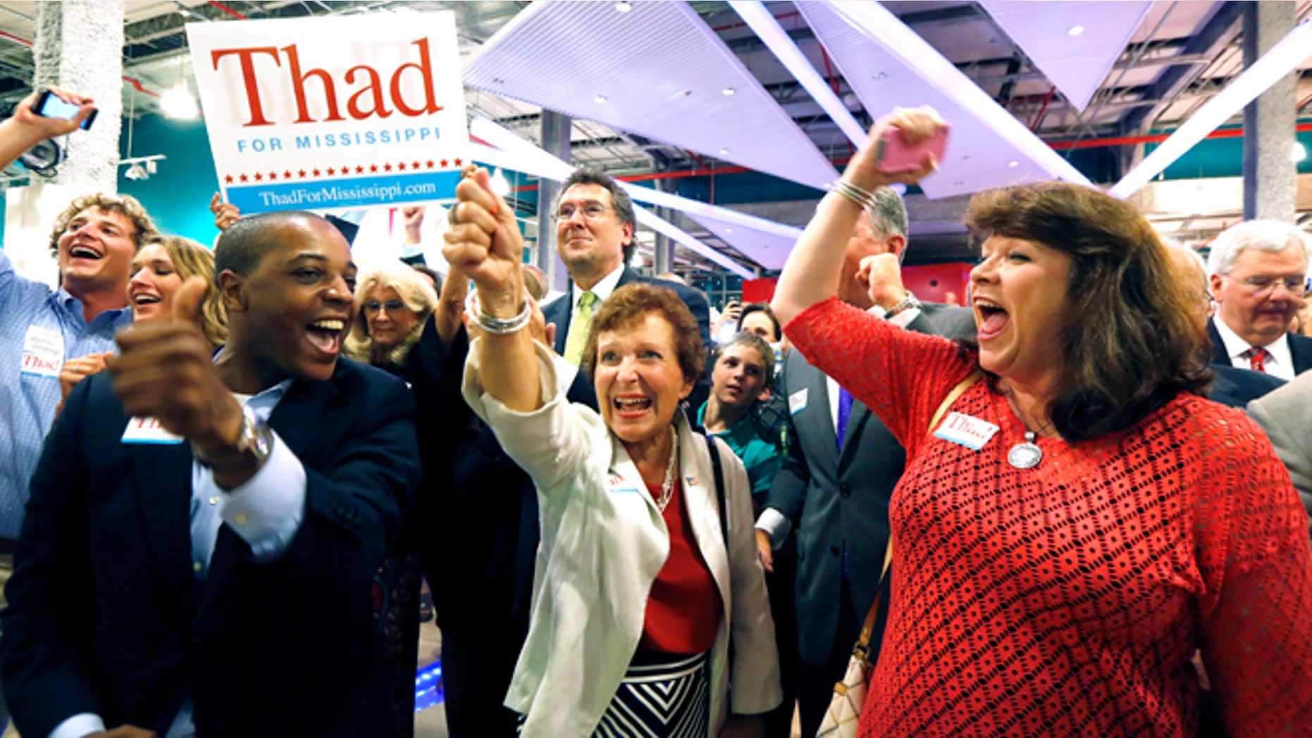 June 24, 2014: Supporters of Sen. Thad Cochran, R-Miss., break into cheer as he is declared the winner in his primary runoff for the GOP nomination for U.S. Senate at his victory party at the Mississippi Children's Museum in Jackson, Miss.