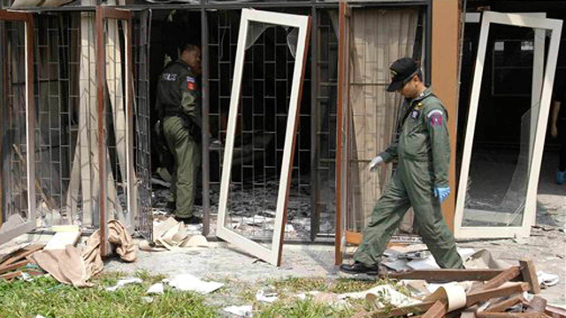 Feb. 15, 2012: Thai Explosive Ordnance Disposal (EOD) officials examine the damage caused by a blast at the house where suspected bomber Saeid Moradi was staying in Bangkok, Thailand.