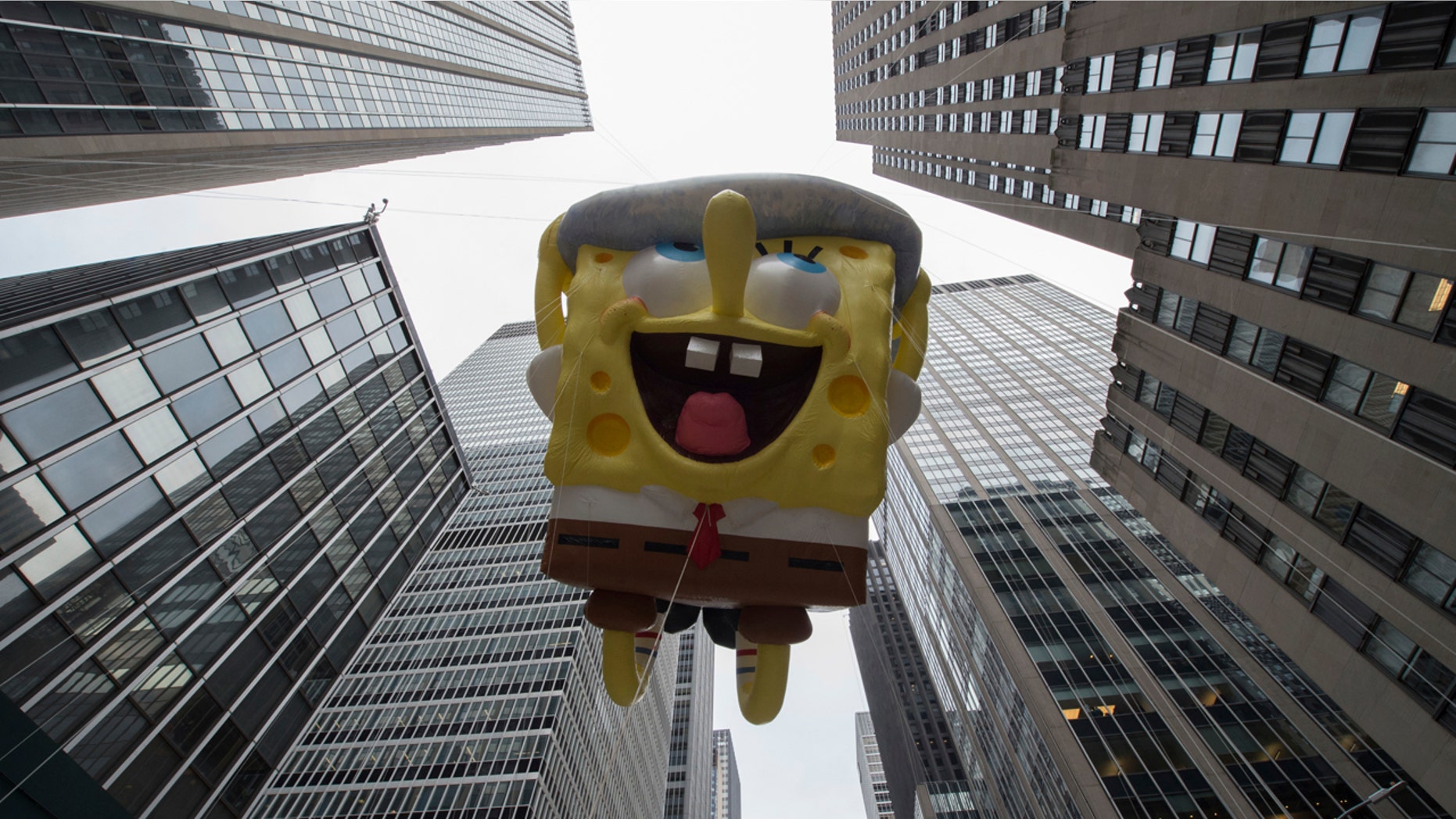 The SpongeBob Square Pants balloon moves down Sixth Avenue during the Macy's Thanksgiving Day Parade, Thursday, Nov. 24, 2016, in New York. (AP Photo/Bryan R. Smith)
