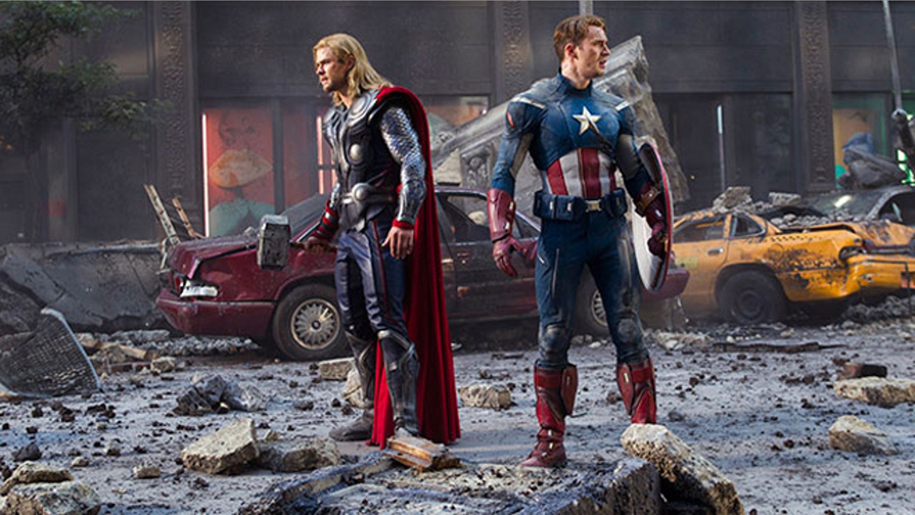 Two Avengers survey a partially destroyed New York, the work of a self-powered energy vortex thingy.