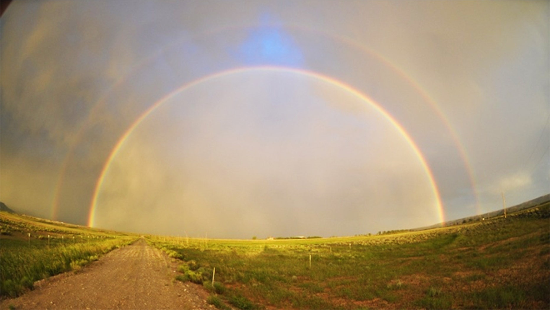 While on vacation on July 18, Texas native Jonathan Boening took this photograph of a double rainbow on a drive to Yellowstone National Park.