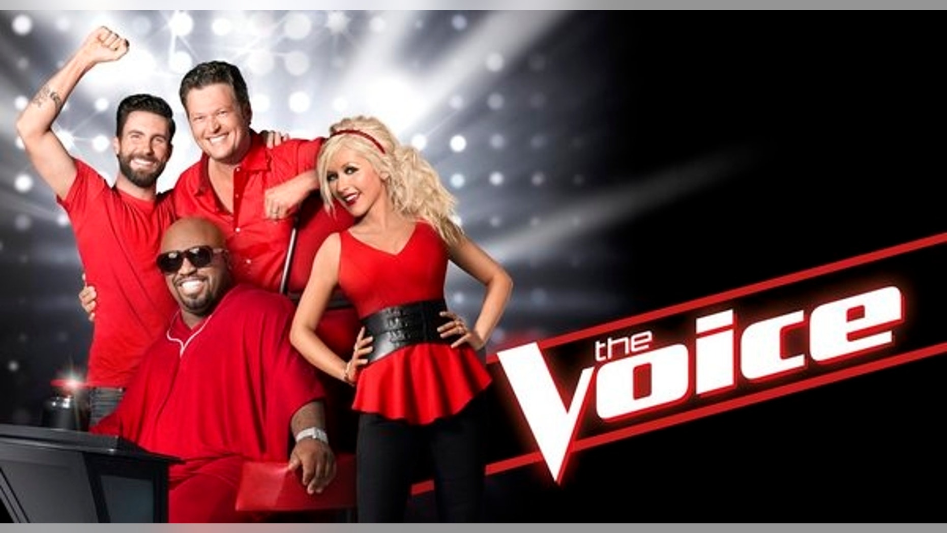 Adam Levine, CeeLo Green, Blake Shelton and Christina Aguilera pose for a promotional photo for "The Voice."