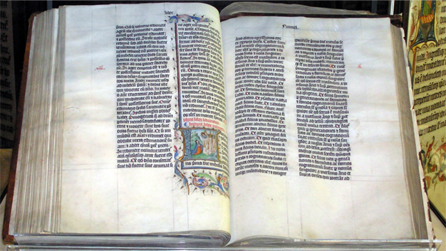 A Bible handwritten in Latin, on display in Malmesbury Abbey, Wiltshire, England.