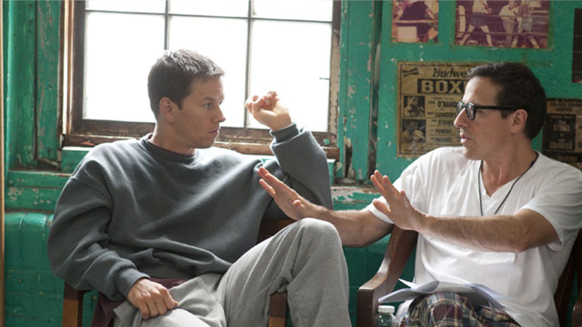 In this publicity image released by Paramount Pictures, Mark Wahlberg, left, and director David O. Russell are shown on the set of The Fighter. Micky Ward, the boxer who was the subject of the new movie, has pledged his brain and spinal cord to a Boston University.