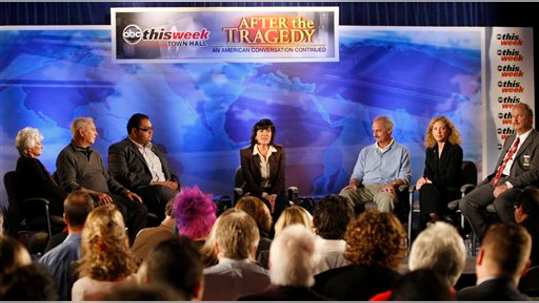 In this photo released by ABC-TV, ABC News correspondent Christiane Amanpour leads a town hall event at the St. Odilia Church in Tucson, Ariz., during a taping of "This Week." The event brought together members of the community and residents who were involved in the shooting in Tucson on Jan. 8, and led to one of the injured being arrested for threatening a Tea Party leader.