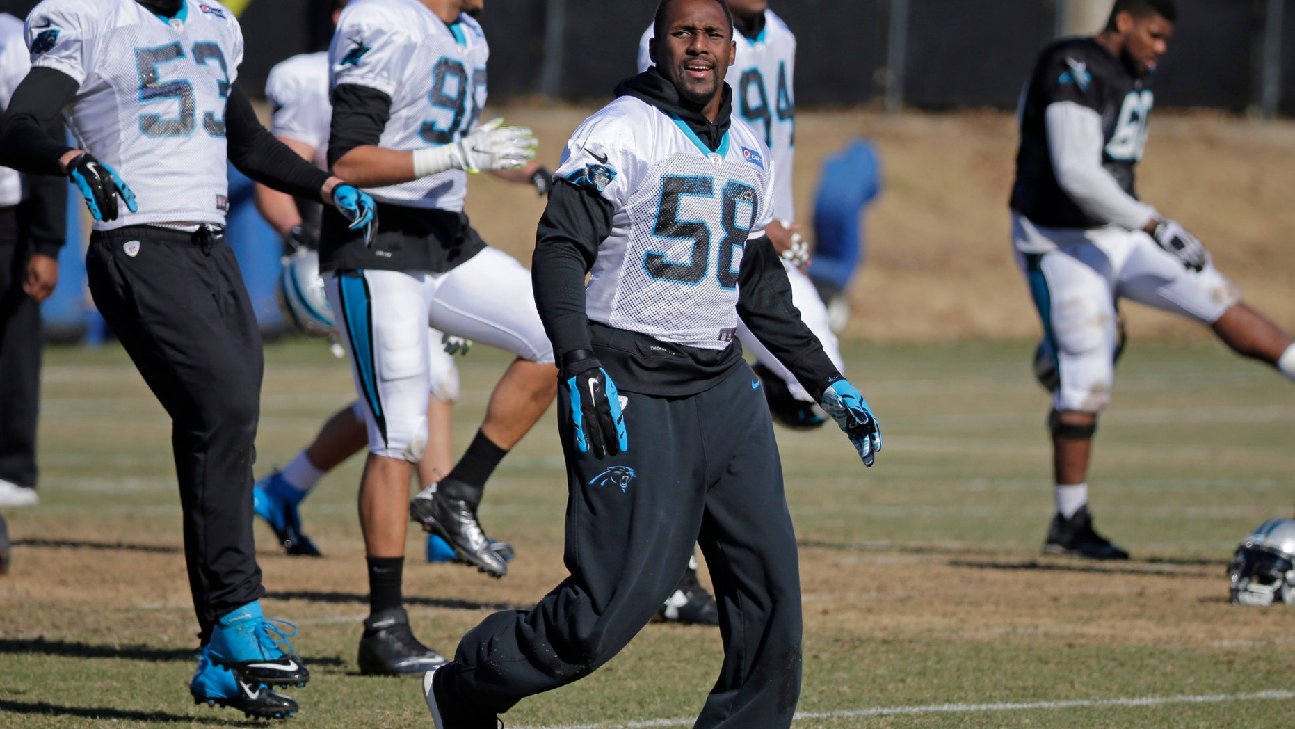 File photo - Carolina Panthers' Thomas Davis stretches during NFL football practice, Friday, Jan. 29, 2016, in Charlotte, N.C. (AP Photo/Chuck Burton)