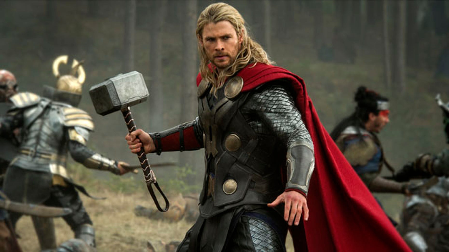 This publicity file photo released by Walt Disney Studios and Marvel shows Chris Hemsworth in a scene from "Thor: The Dark World." Thor: The Dark World continued its box-office reign with $38.5 million in its second week, holding off The Best Man Holiday, according to studio estimates Sunday, Nov. 17, 2013.