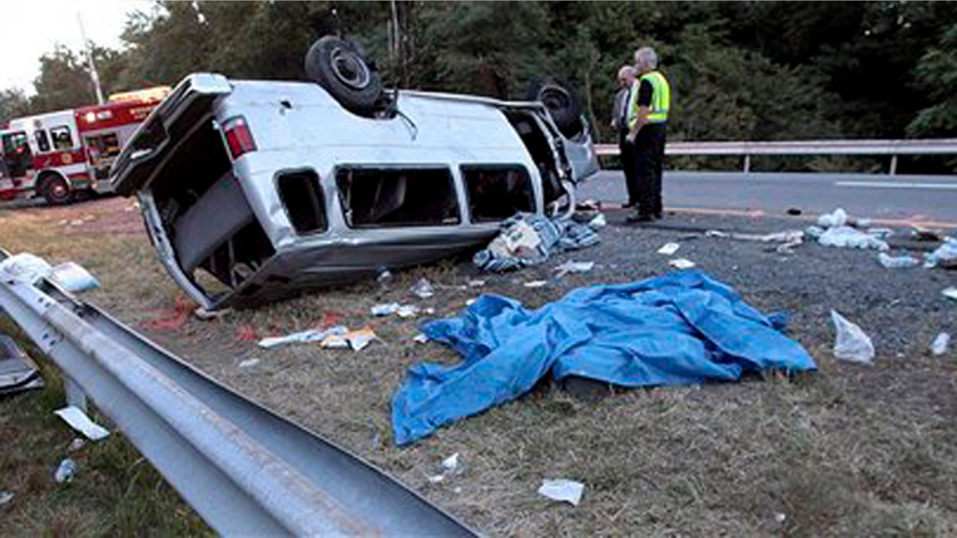 Sept. 18, 2010: State police investigate the scene of a fatal accident in Woodbury, N.Y. A passenger van carrying members of a church flipped over on the New York State Thruway on Saturday, killing at least six people and injuring eight others, authorities said.