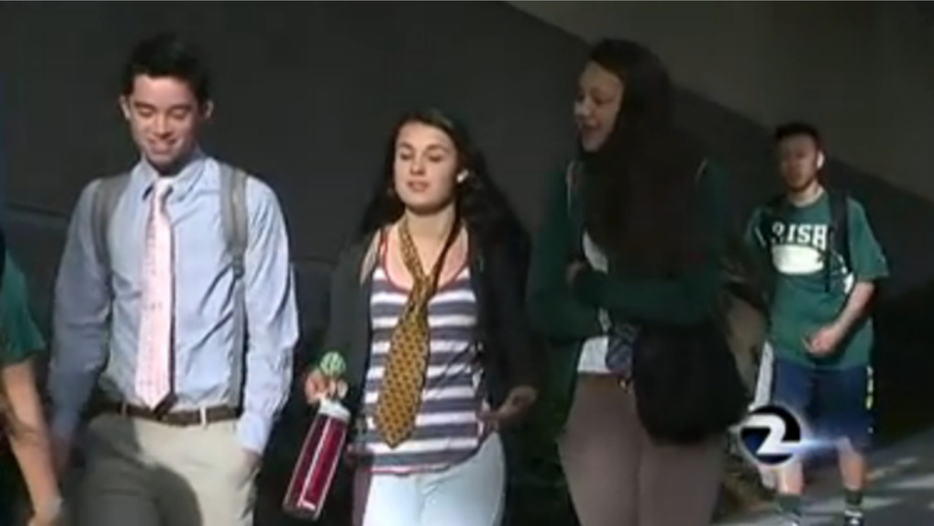 May 17, 2014: Students at Sacred Heart Cathedral Preparatory wore ties over their polo shirts and sweatshirts on campus to protest the administration's decision to omit senior Jessica Urbina's photo.