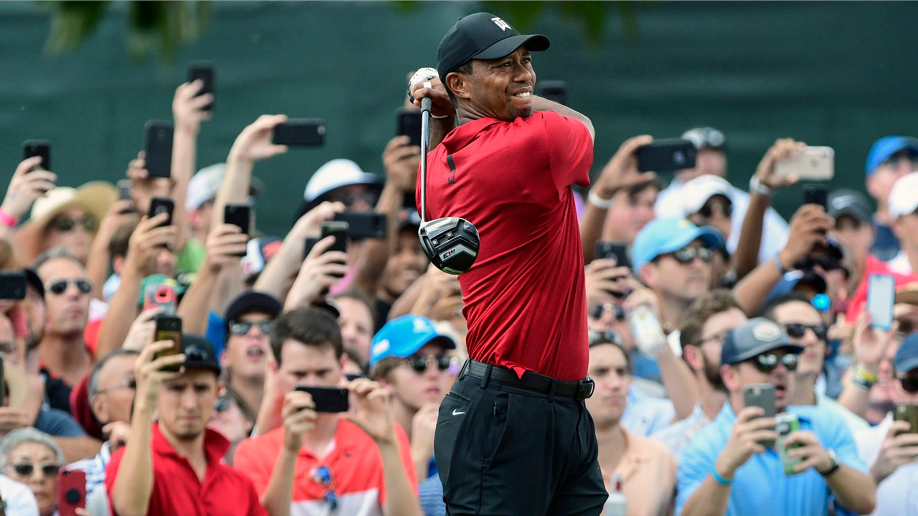 Tiger Woods hits from the third tee during the final round of the Tour Championship golf tournament Sunday, Sept. 23, 2018, in Atlanta. (AP Photo/John Amis)
