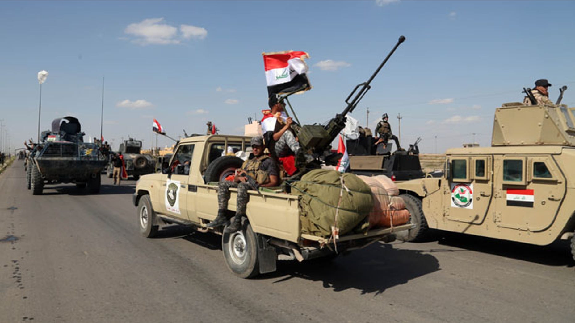 March 26, 2015: Iraqi security forces prepare to attack Islamic State positions in Tikrit.