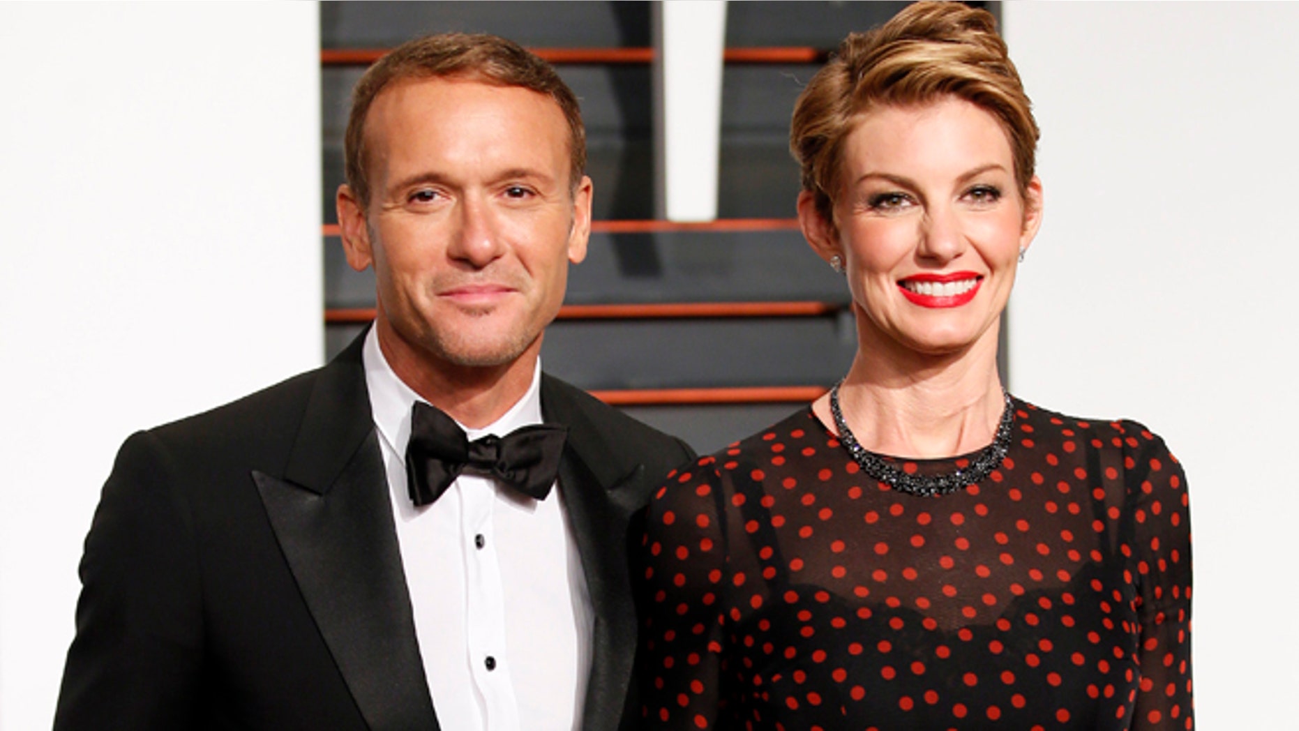 Feb 22, 2015. Country musicians Tim McGraw and wife, Faith Hill, arrive at the 2015 Vanity Fair Oscar Party in Beverly Hills, California.