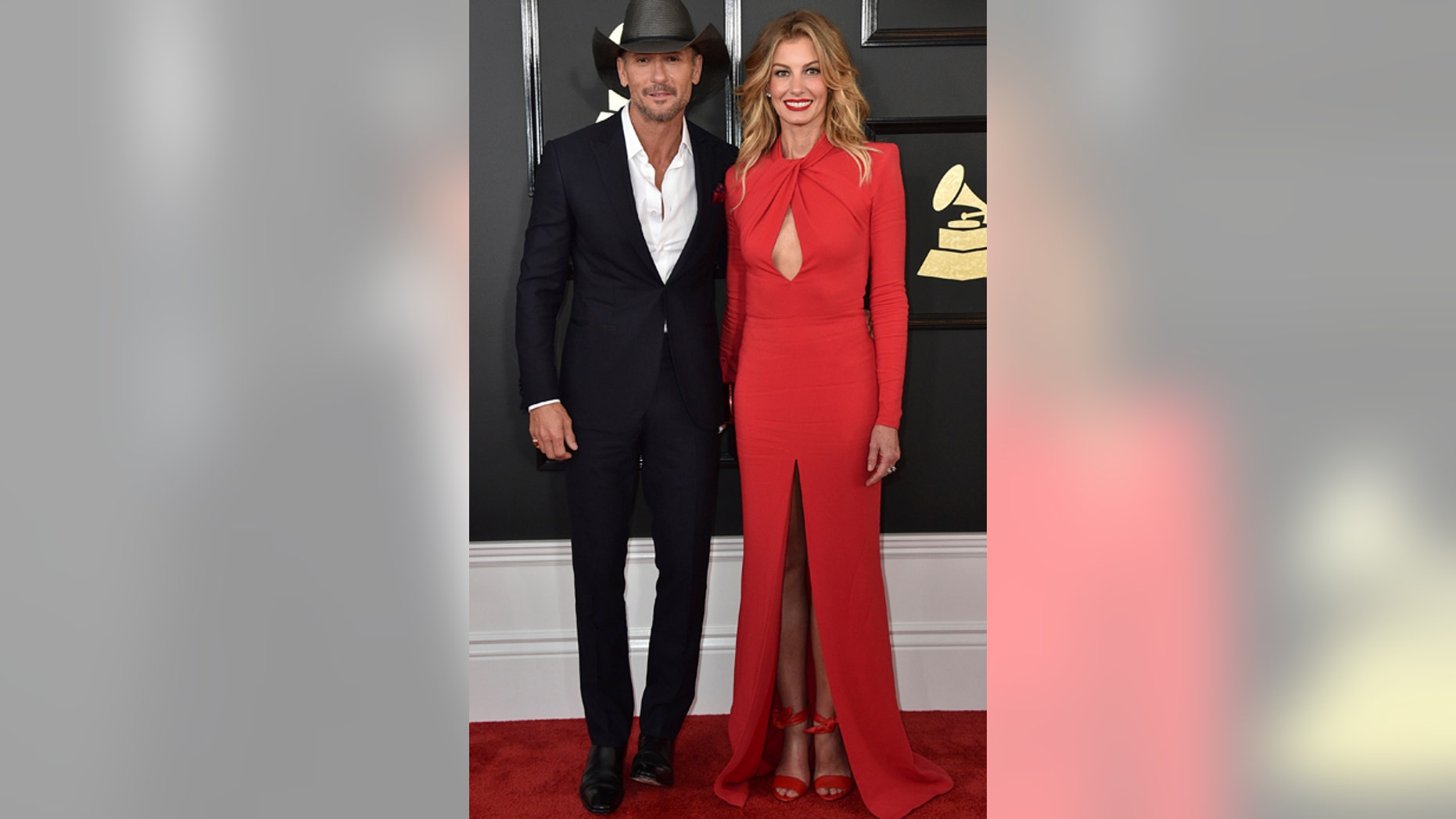 Tim McGraw and Faith Hill are facing a copyright lawsuit for their new single "The Rest of Our Life." Here, the couple attend the 59th annual Grammy Awards in Los Angeles on Feb. 12, 2017.