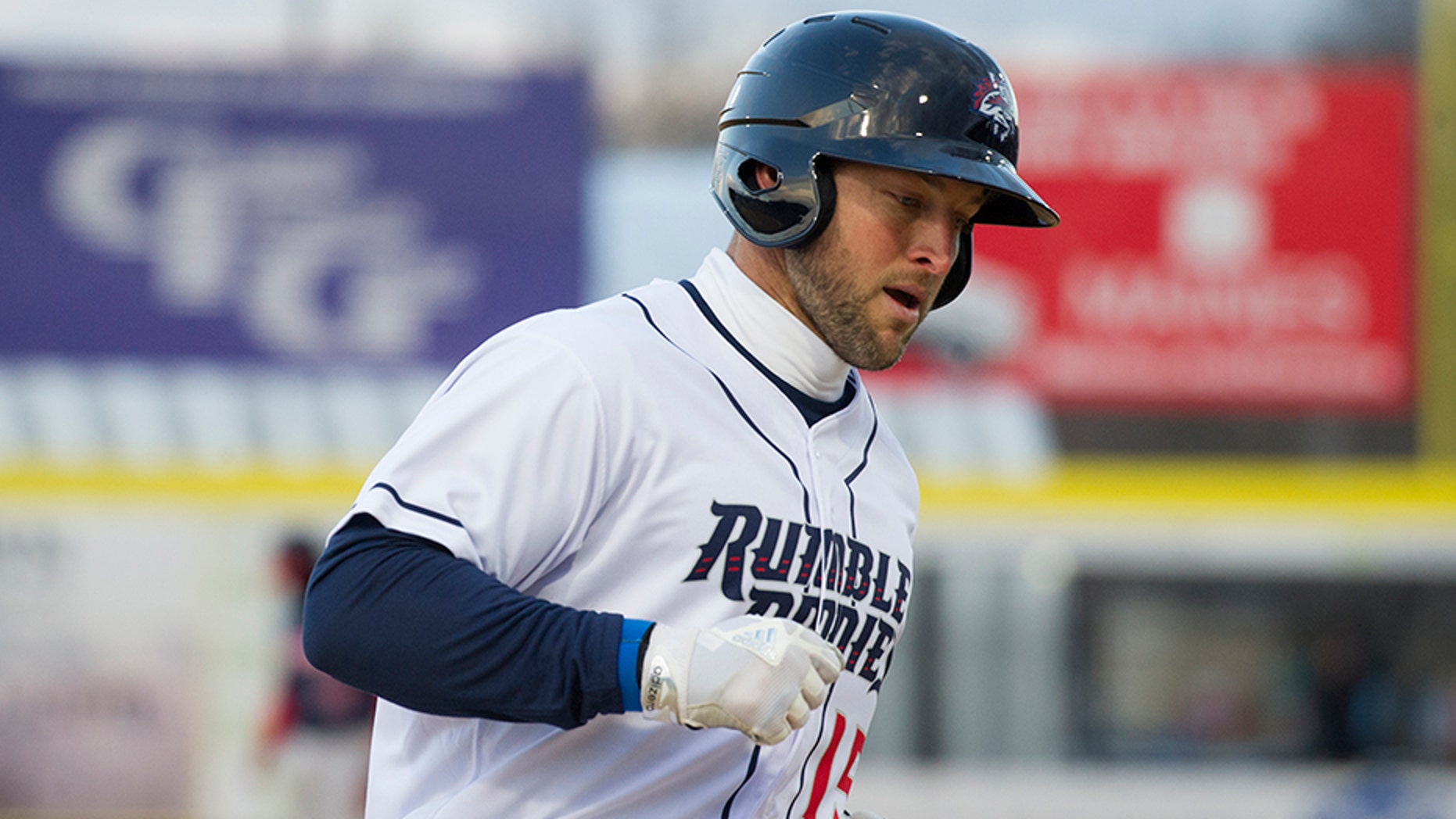 Tim Tebow, playing for the Binghamton Rumble Ponies, rounds third base after hitting a three-run home run in the first inning against the Portland Sea Dogs in a Double-A baseball game Thursday, April 5, 2018, in Binghamton, N.Y. (AP Photo/Matt Smith)