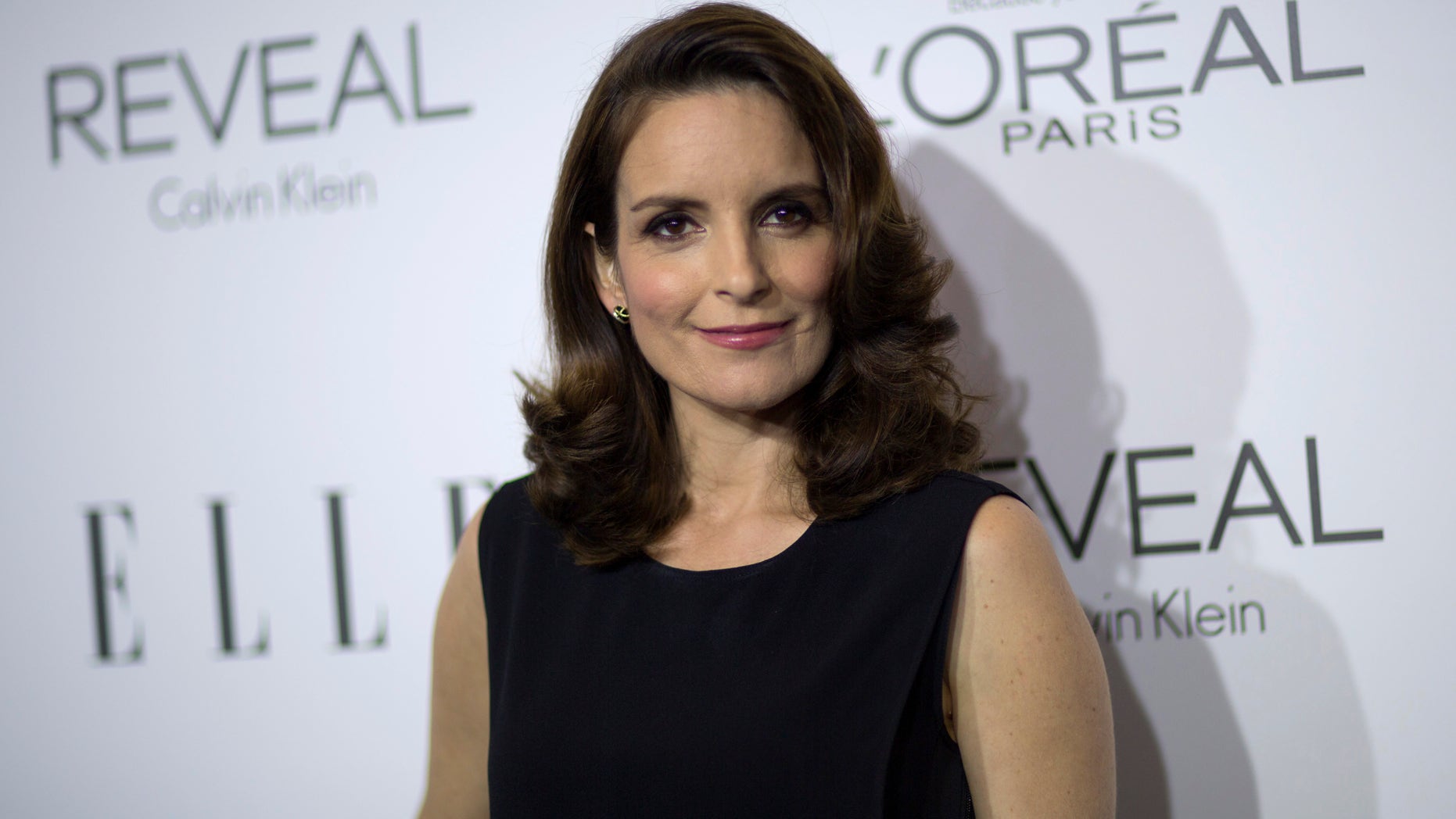 October 20, 2014. Actress and honoree Tina Fey poses at the 21st annual ELLE Women in Hollywood Awards in Los Angeles.