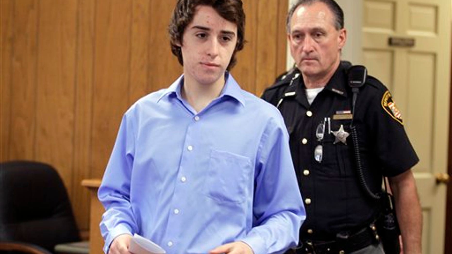 June 8, 2012: T.J. Lane is brought in to court for his arraignment by sheriff's deputies in Chardon, Ohio.