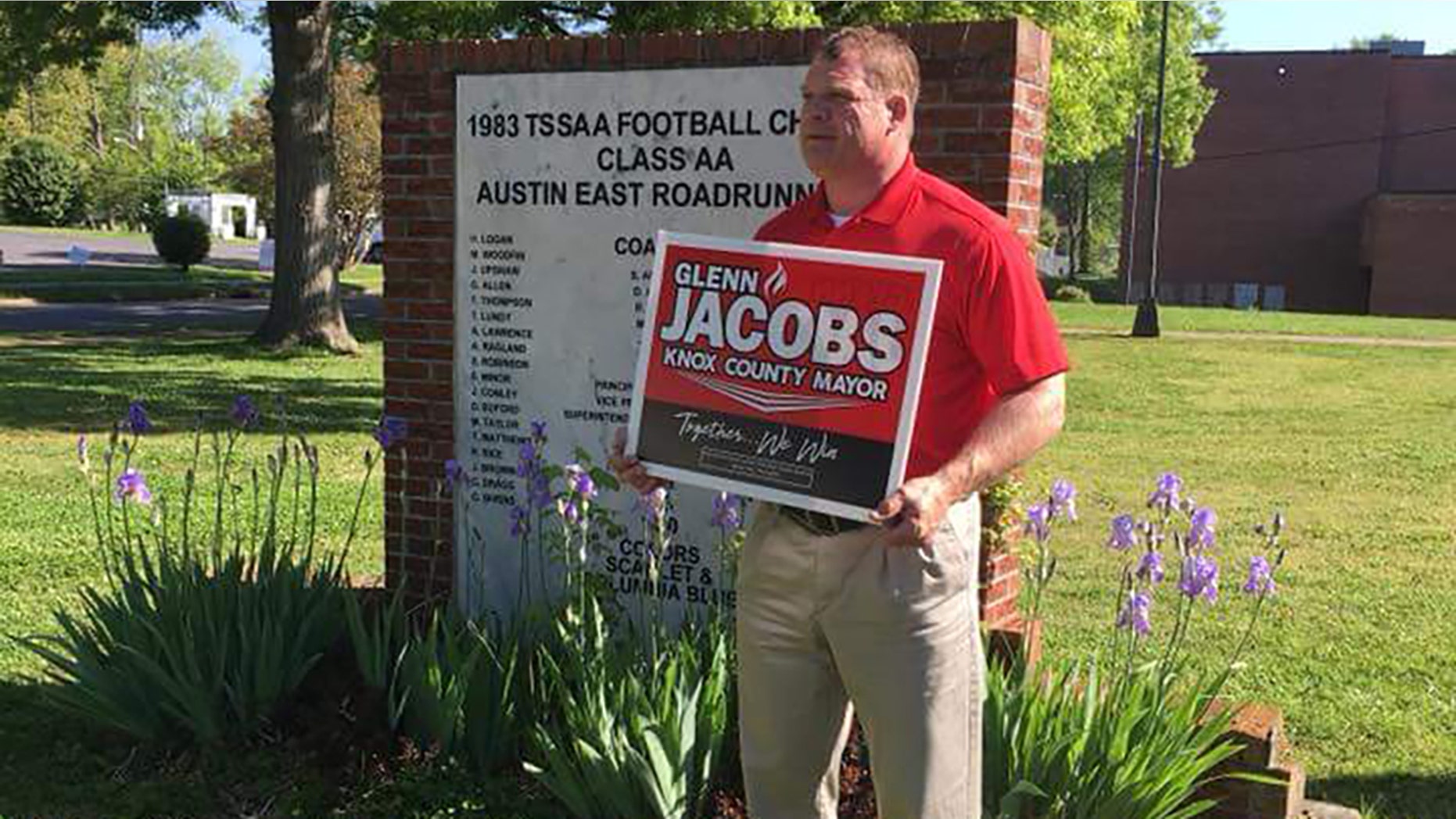 Glenn Jacobs, known as WWE's Kane, campaigns ahead of a primary election.