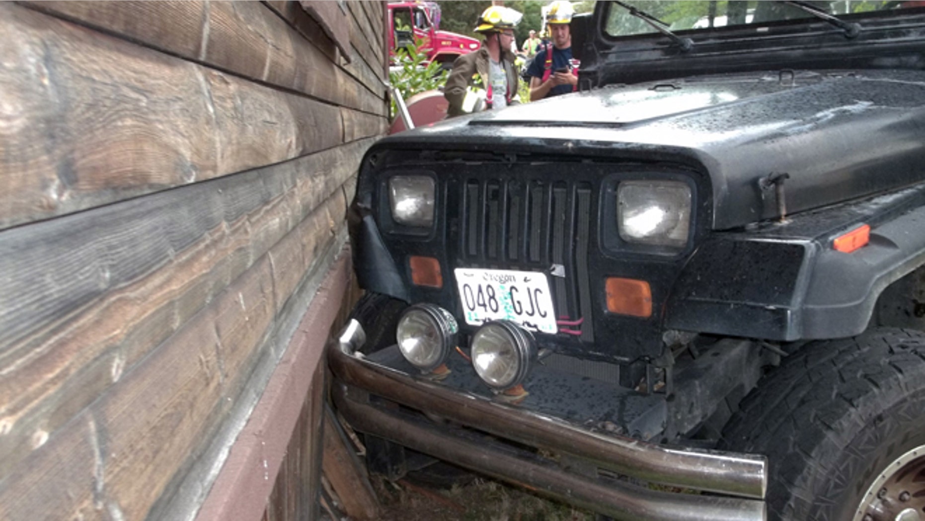 July 24, 2014: This photo provided by the Myrtle Creek Police Department shows a Jeep that authorities say a toddler crashed into an home in Myrtle Creek, Ore. The 3-year-old boy wearing only a diaper climbed into the Jeep and knocked it out of gear, according to authorities. Witnesses said it rolled down the street, through an intersection and into the house, causing minor damage. After the crash authorities said the toddler ran back to his home to watch cartoons.