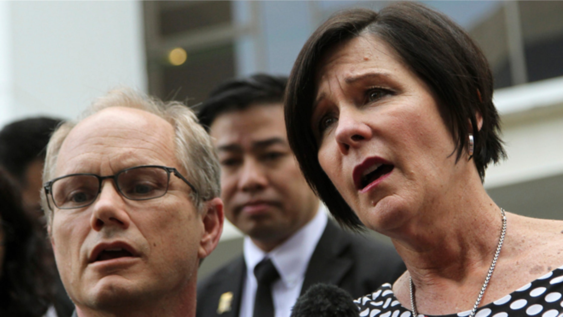 May 15, 2013: Rick and Mary Todd, parents of late American software engineer Shane Truman Todd, leave the Subordinate Courts of Singapore in Singapore. (AP/Wong Maye-E)