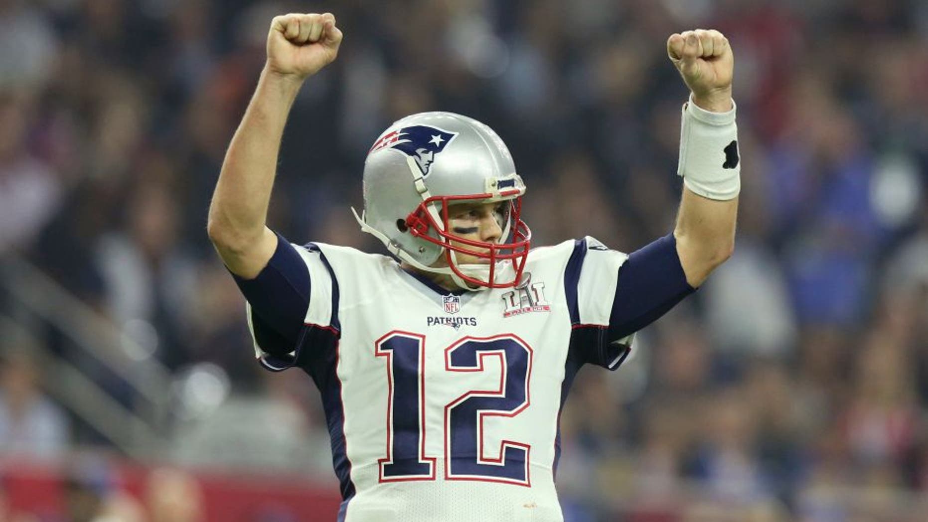 New England Patriots QB Tom Brady #12 celebrates a touchdown against the Atlanta Falcons at Super Bowl 51 on Sunday, February 5, 2017 in Houston, TX. (AP Photo/Gregory Payan)