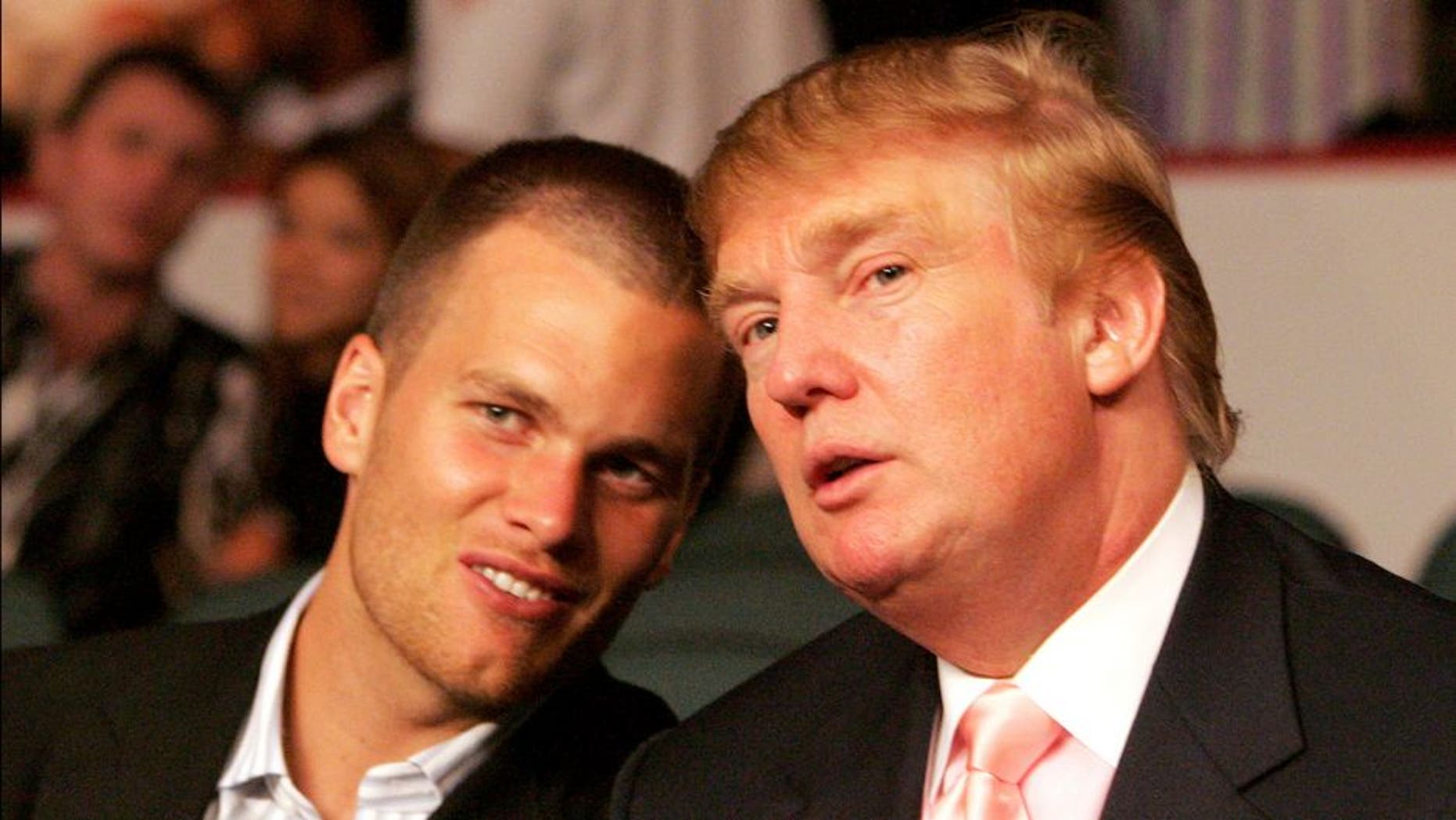 New England Patriots quarterback Tom Brady chats with Donald Trump (Photo by Donna Connor/WireImage)