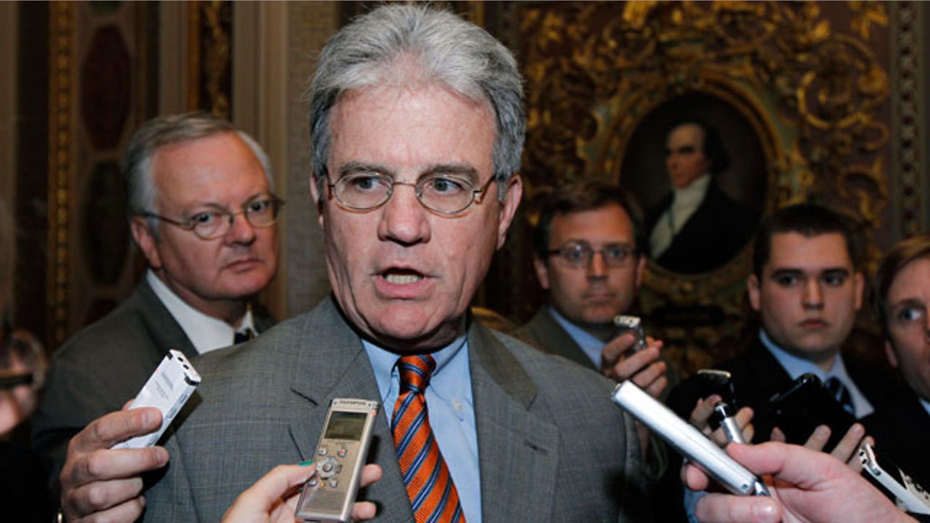 Sen. Tom Coburn, R-Okla., talks with reporters before their caucus luncheon on Capitol Hill Tuesday, June 14, 2011 in Washington. (AP)