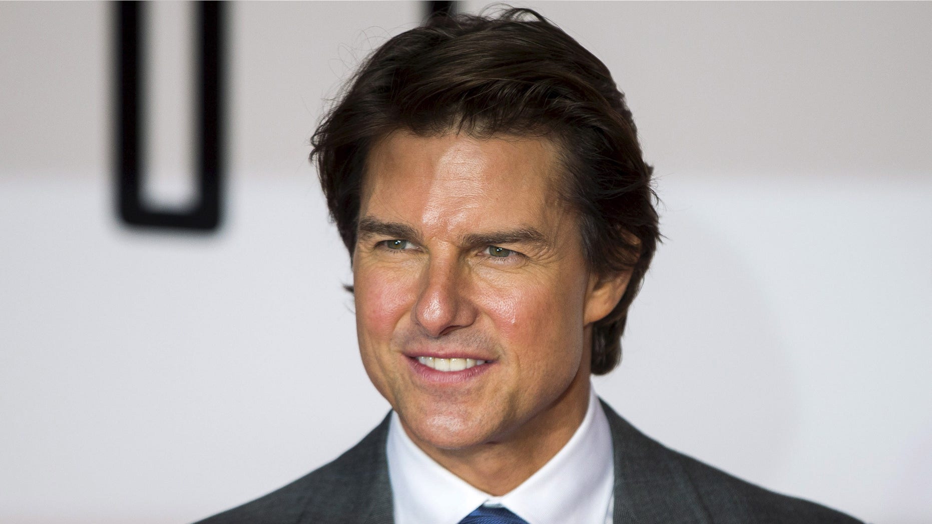 July 25, 2015. U.S. actor Tom Cruise poses for photographers at a British screening of the film "Mission Impossible: Rogue Nation" in London.