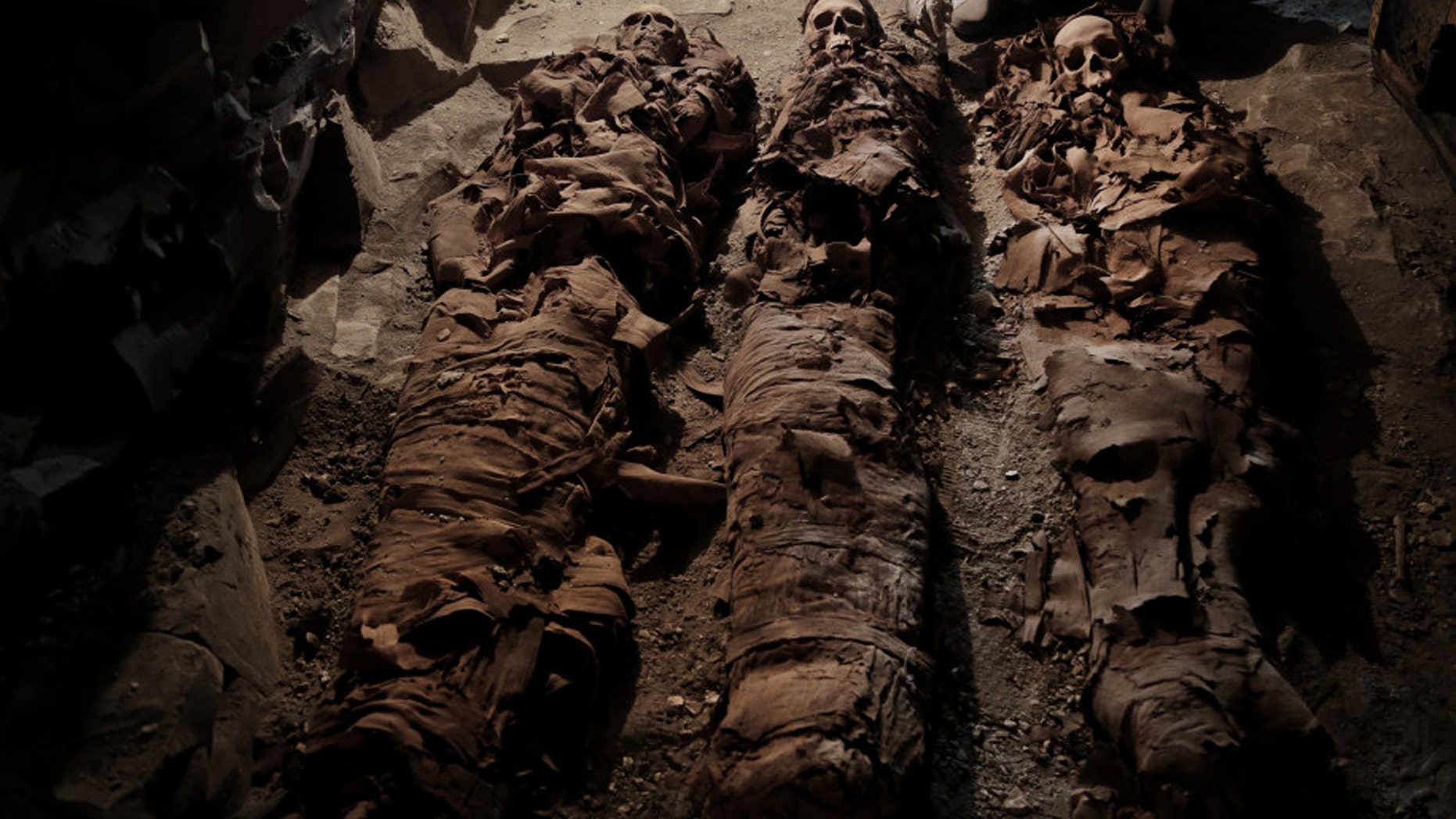 Mummies found in the New Kingdom tomb that belongs to a royal goldsmith in a burial shaft, in Luxor, Egypt. (Credit: Associated Press)