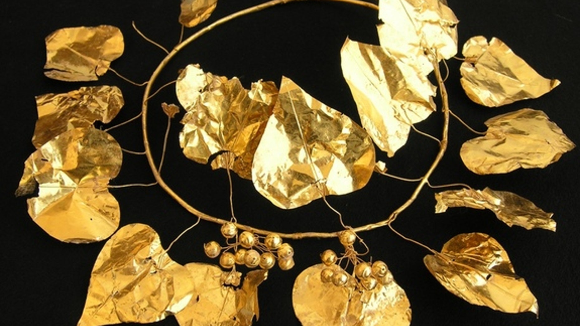 A gold wreath in the shape of an ivy plant discovered at a 2,400-year-old tomb complex in Cyprus.