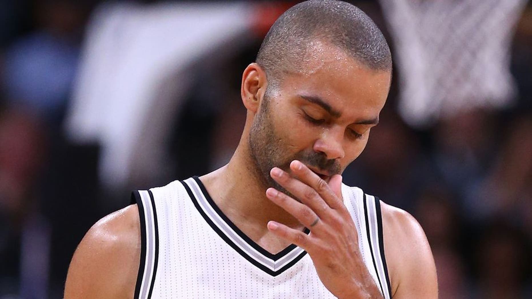 SAN ANTONIO, TX - MAY 03: Tony Parker #9 of the San Antonio Spurs reacts against the Houston Rockets during Game Two of the NBA Western Conference Semi-Finals at AT&T Center on May 3, 2017 in San Antonio, Texas. NOTE TO USER: User expressly acknowledges and agrees that, by downloading and or using this photograph, User is consenting to the terms and conditions of the Getty Images License Agreement. (Photo by Ronald Martinez/Getty Images)