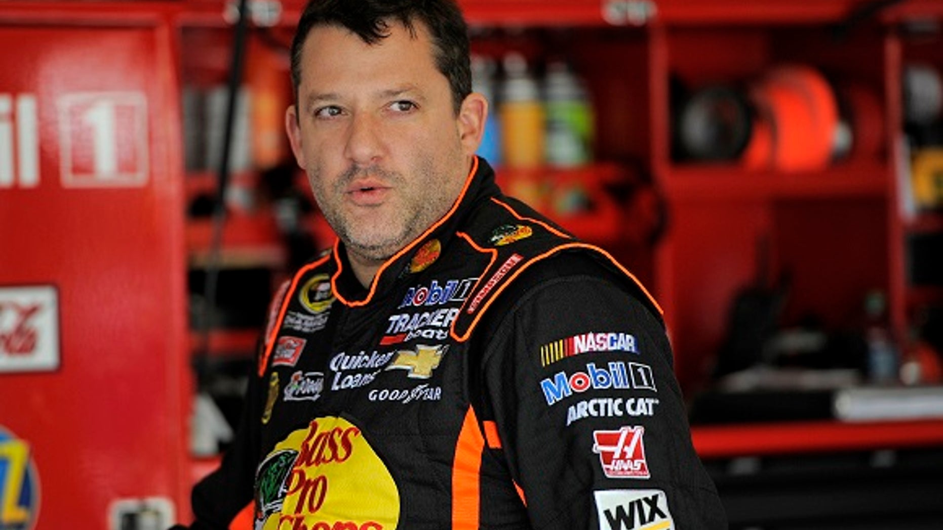 A Florida woman was taken into custody after being accusing of stalking NASCAR star Tony Stewart.