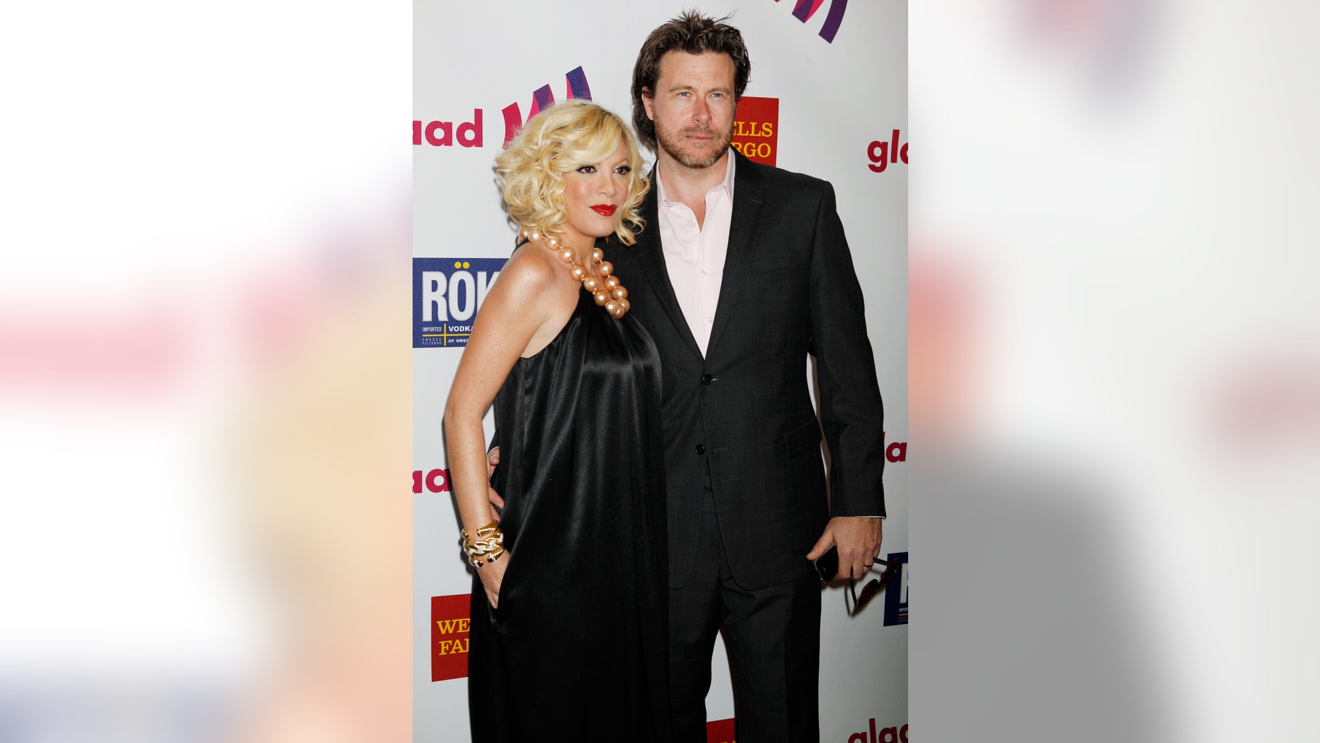 April 10, 2011. Tori Spelling and husband Dean McDermott arrive at the 22nd annual Gay and Lesbian Alliance Against Defamation (GLAAD) Media Awards in Los Angeles, California.