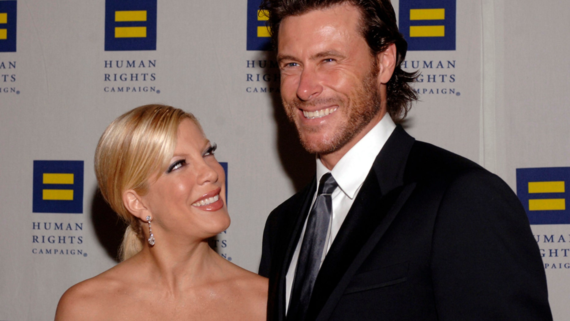 Actress Tori Spelling, left, and husband Dean McDermott, right, have reportedly begun counseling to turn their marriage around.