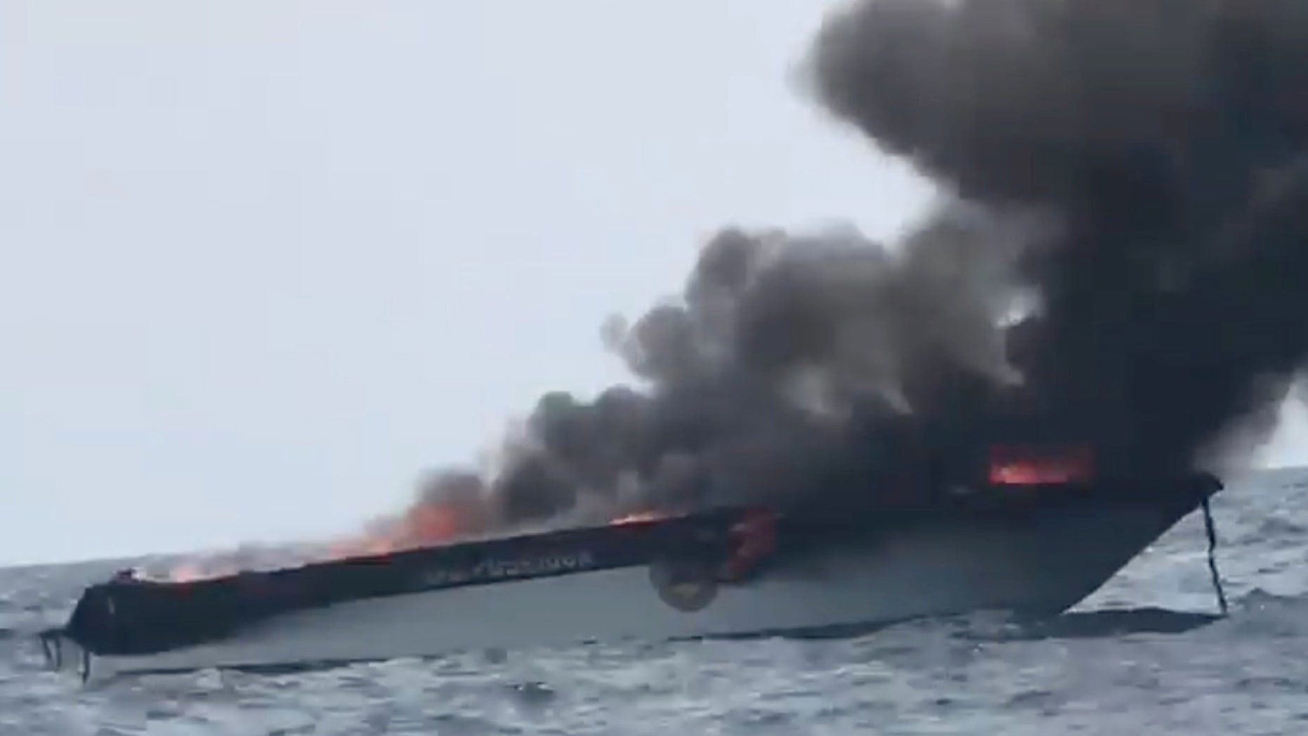 Smoke rises from a tourist speedboat after its explosion in Phi Phi Islands, Thailand, January 14, 2018 in this still image taken from a video obtained from social media.