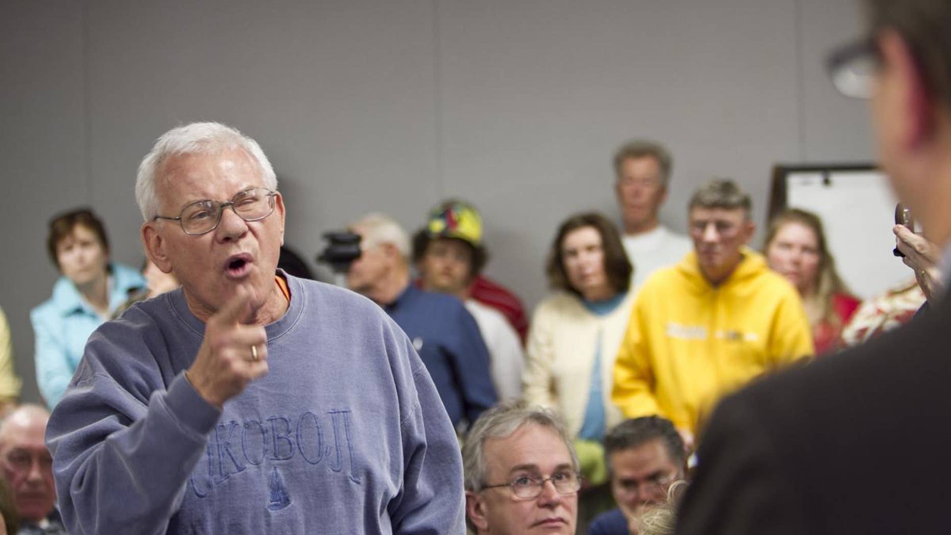 William Kouth of Omaha addresses Rep. Lee Terry R-Neb., during a town hall meeting held to discuss the Republican party's plan to privatize Medicare, in Omaha, Neb., Thursday, April 28, 2011. (AP Photo/Nati Harnik)