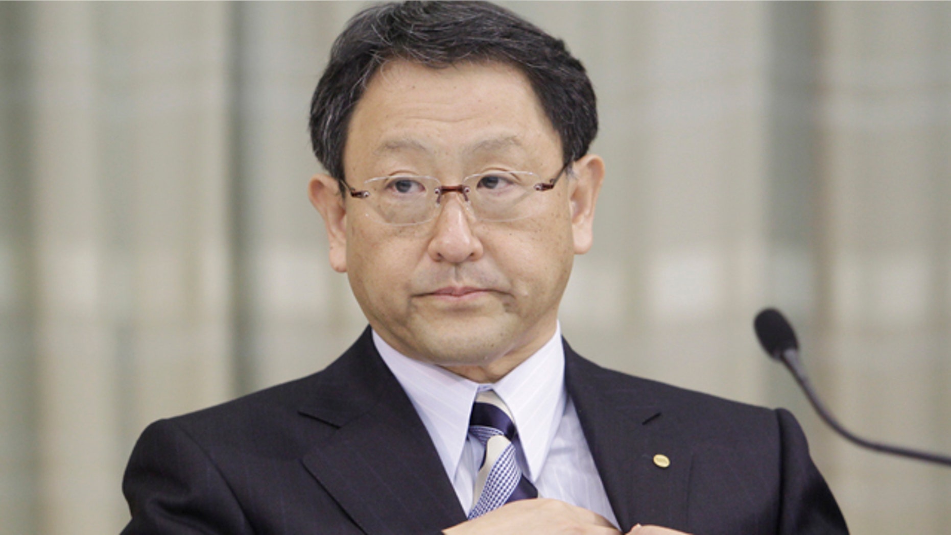 April 22: Toyota Motor Corp. President Akio Toyoda attends a press conference in Tokyo. Toyota said its global car production, disrupted by parts shortages from Japan's earthquake and tsunami, won't return to normal until November or December -- threatening its spot as the world's top-selling automaker. (AP)