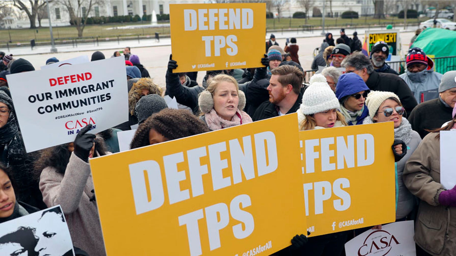 Demonstrators protest the Trump administration's decision to strip TPS for Salvadorans in the U.S.
