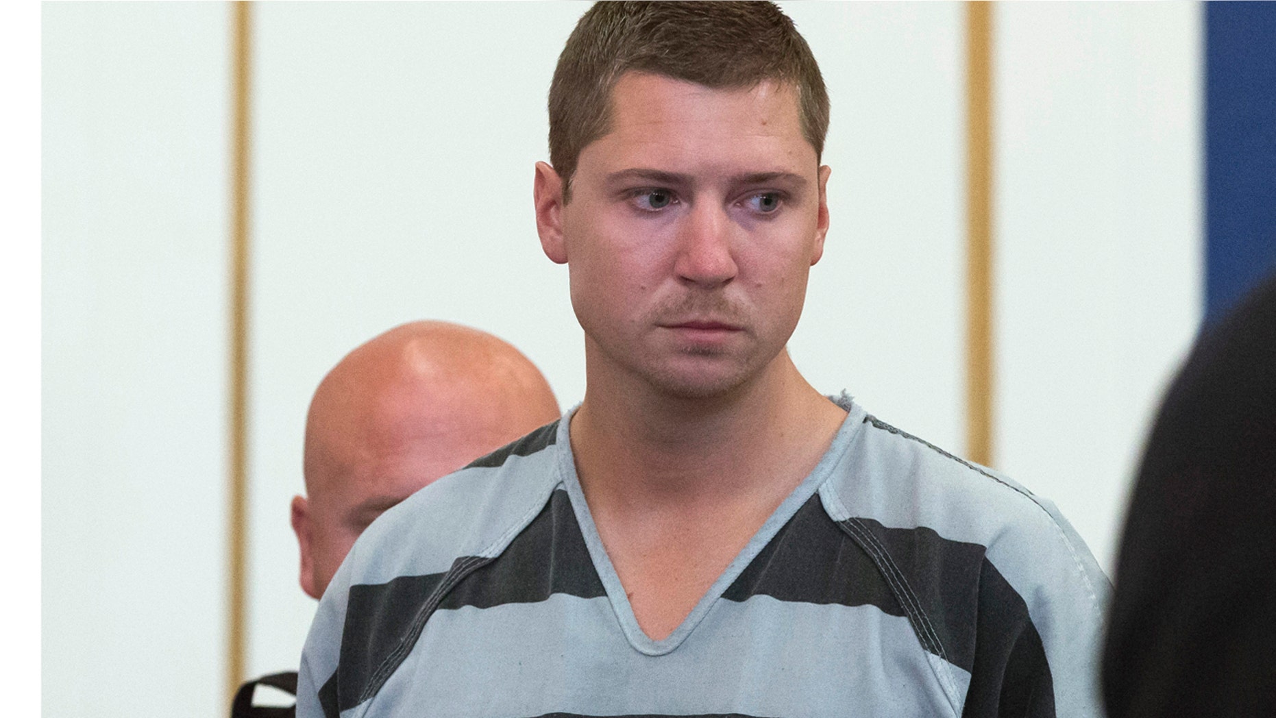 FILE - In a Thursday, July 30, 2015 file photo, former University of Cincinnati police officer Ray Tensing appears at Hamilton County Courthouse for his arraignment in the shooting death of motorist Samuel DuBose, in Cincinnati. (AP Photo/John Minchillo, File)