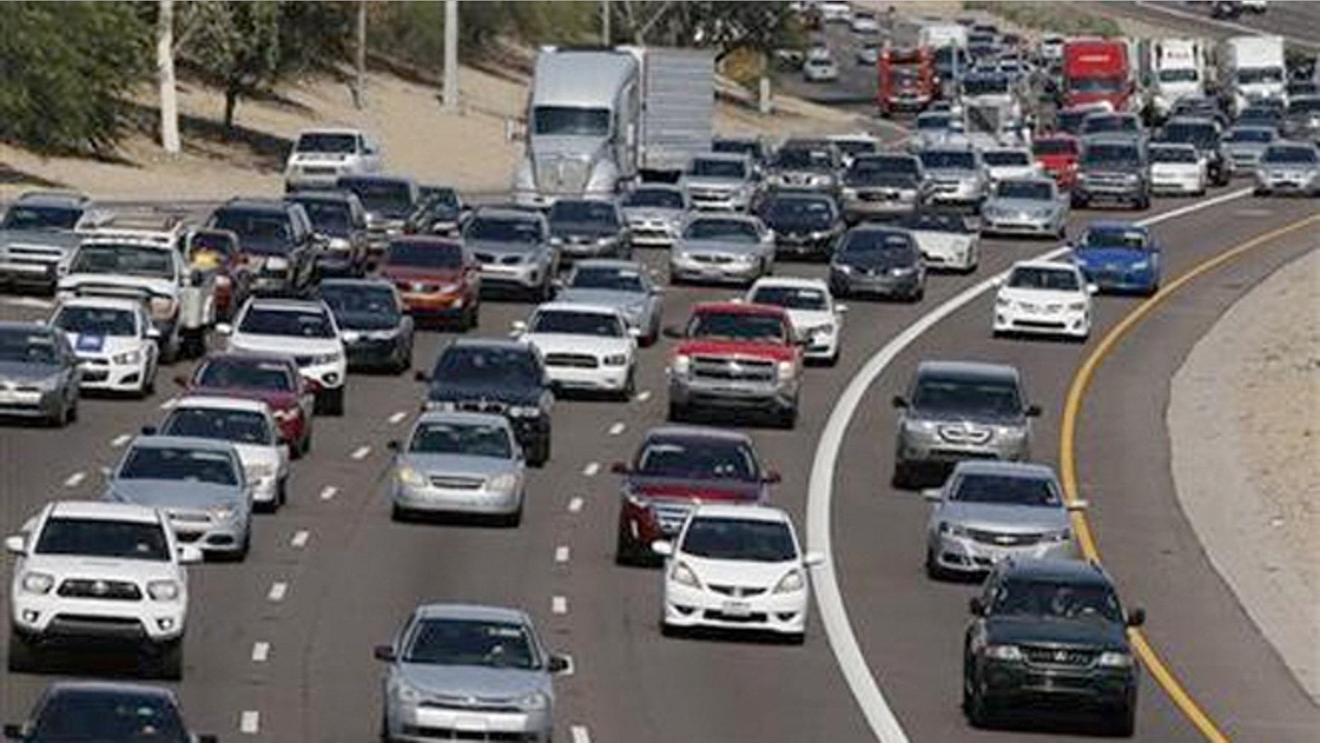 Low gas prices and an improving economy will prompt Americans to hit the road for the Fourth of July.