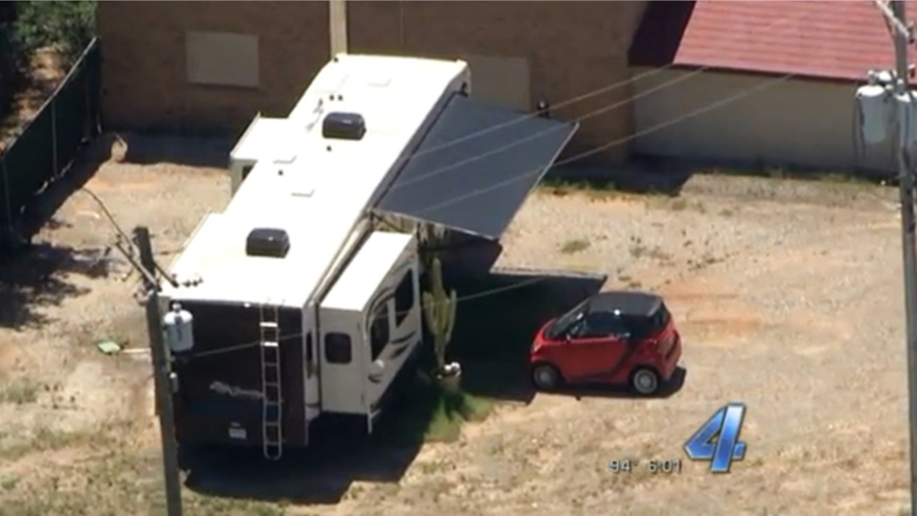 In this July 27, 2015, frame from video provided by KFOR-TV, a trailer sits on the grounds of the governor's mansion in Oklahoma City.