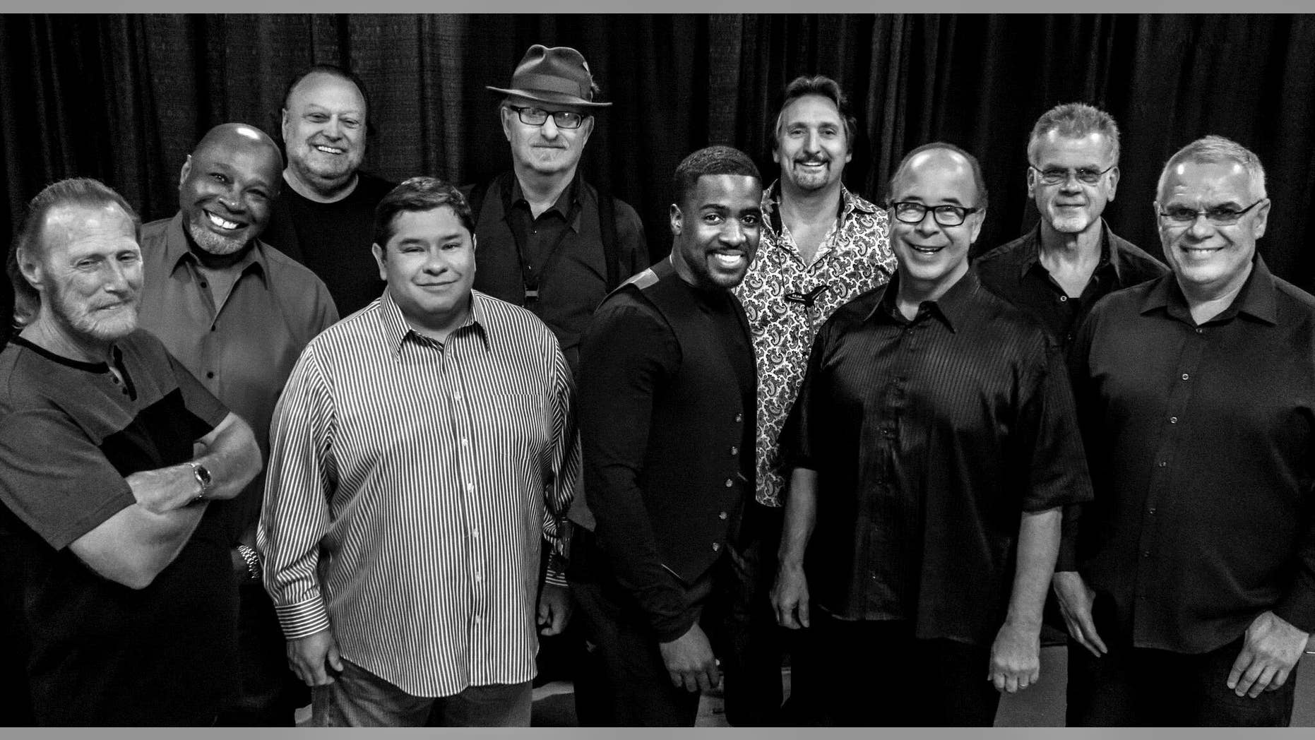 This Aug. 2016 photo provided by courtesy of Tower of Power/Webster Public Relations, shows the band members from Tower of Power, from left, Rocco Prestia, Roger Smith, Sal Cracchiolo, Adolfo Acosta, Stephen "Doc" Kupka, Marcus Scott, Tom E. Politzer, Emilio Castillo, David Garibaldi, and Jerry Cortez.