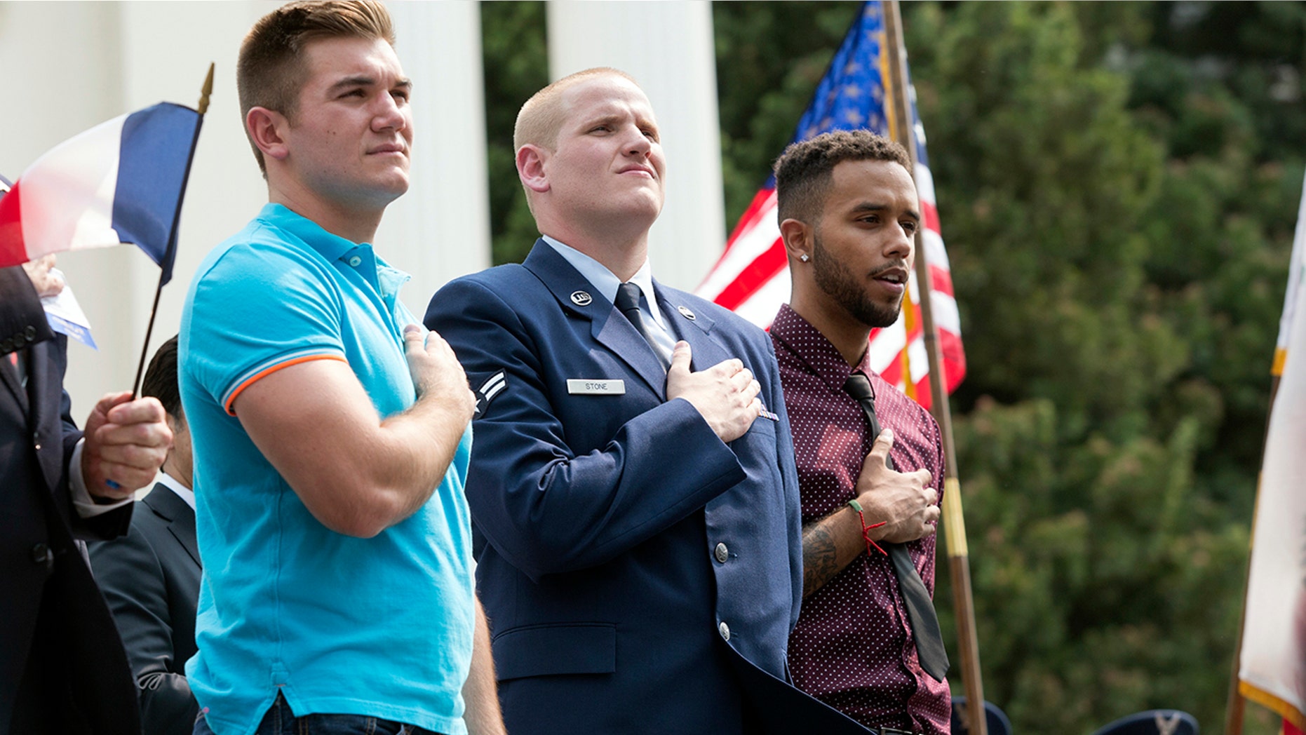 In this Sept. 11, 2015 file photo, Oregon National Guardsman Alek Skarlatos, left, U.S. Airman Spencer Stone, center, and Anthony Sadler attend a parade held to honor the three Americans who stopped a gunman on a Paris-bound passenger train, in Sacramento, Calif. The three Sacramento-area men who thwarted a terror attack on a French train in 2015 will play themselves in a Clint Eastwood-directed film about their heroic feat. Sadler, Skarlatos, and Stone will star in "15:17 to Paris," which began production this week.