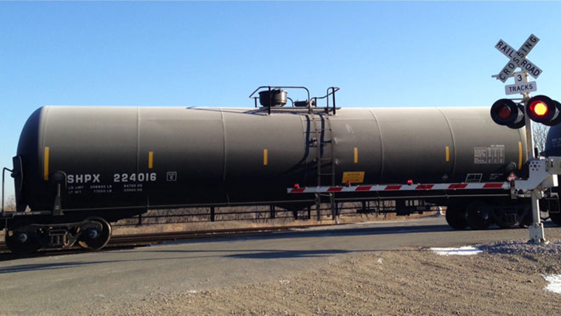 Nov. 14, 2014: A train loaded with oil tank cars idles on a track in North Dakota.