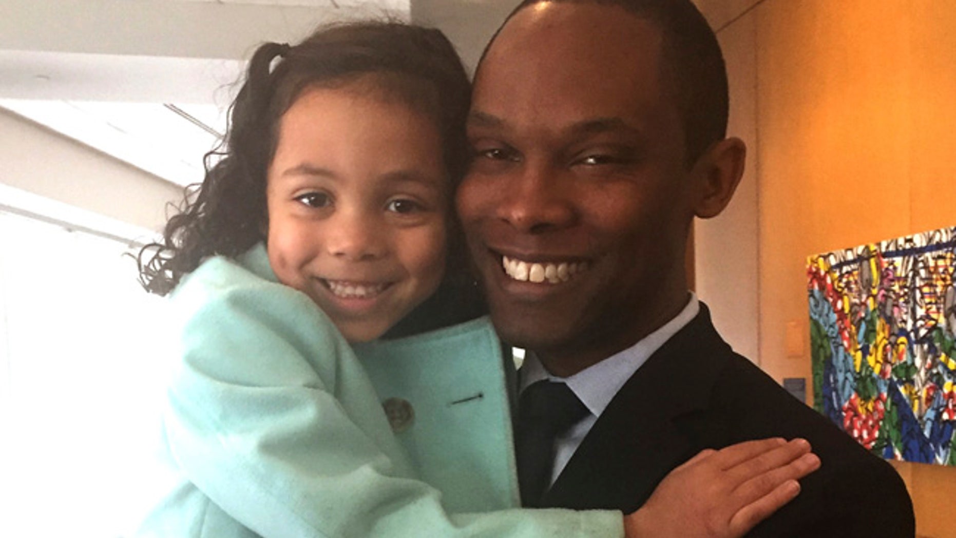 Ellie Ford, 5, is seen with her father, JR Ford, before their meeting with Education Secretary Betsy DeVos in Washington. Families of transgender students came away from a meeting with DeVos saying that she was receptive to their concerns.