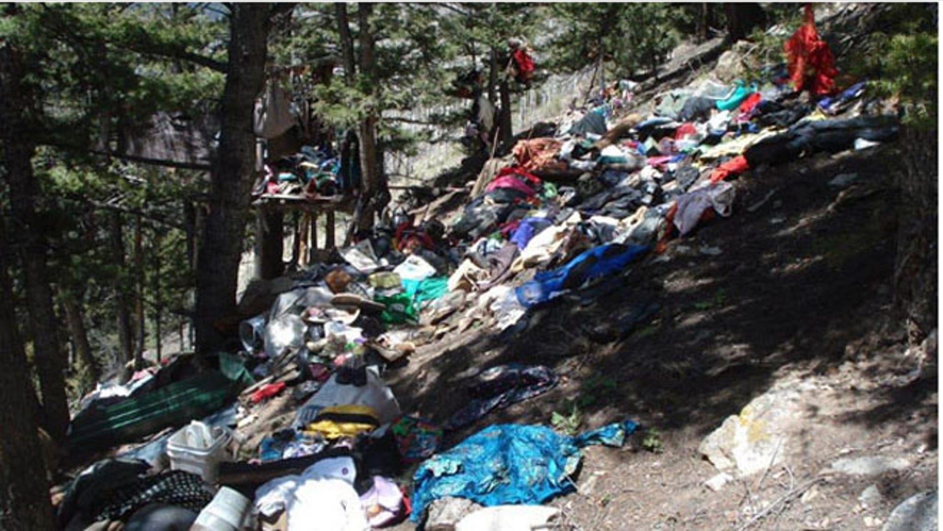 Trash pile in Colorado's Uncompahgre National Forest. (US Attorney's Office)