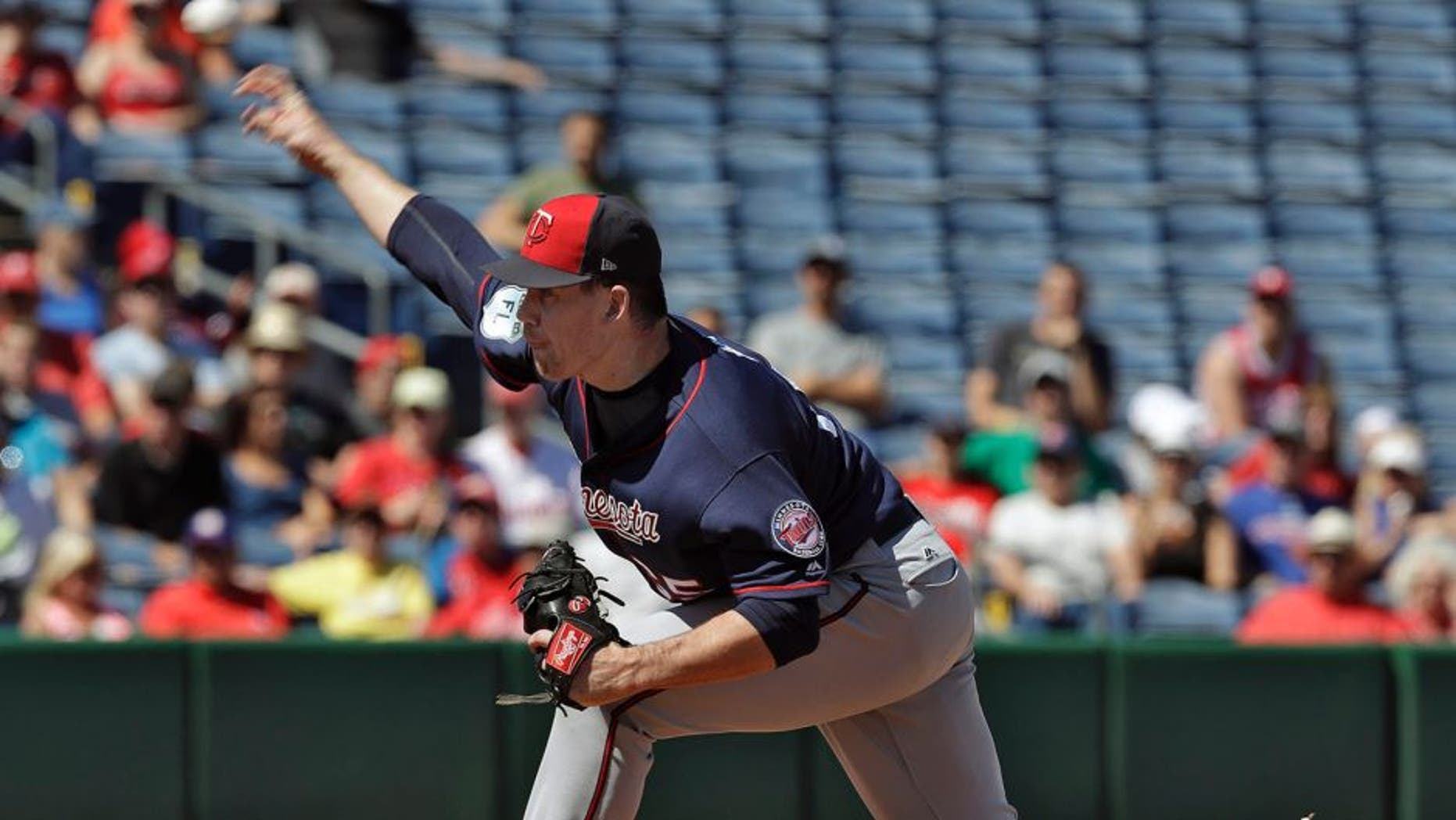 Minnesota Twins pitcher Trevor May delivers to the Philadelphia Phillies during the first inning of a spring training baseball game Friday, March 3, 2017, in Clearwater, Fla. (AP Photo/Chris O'Meara)