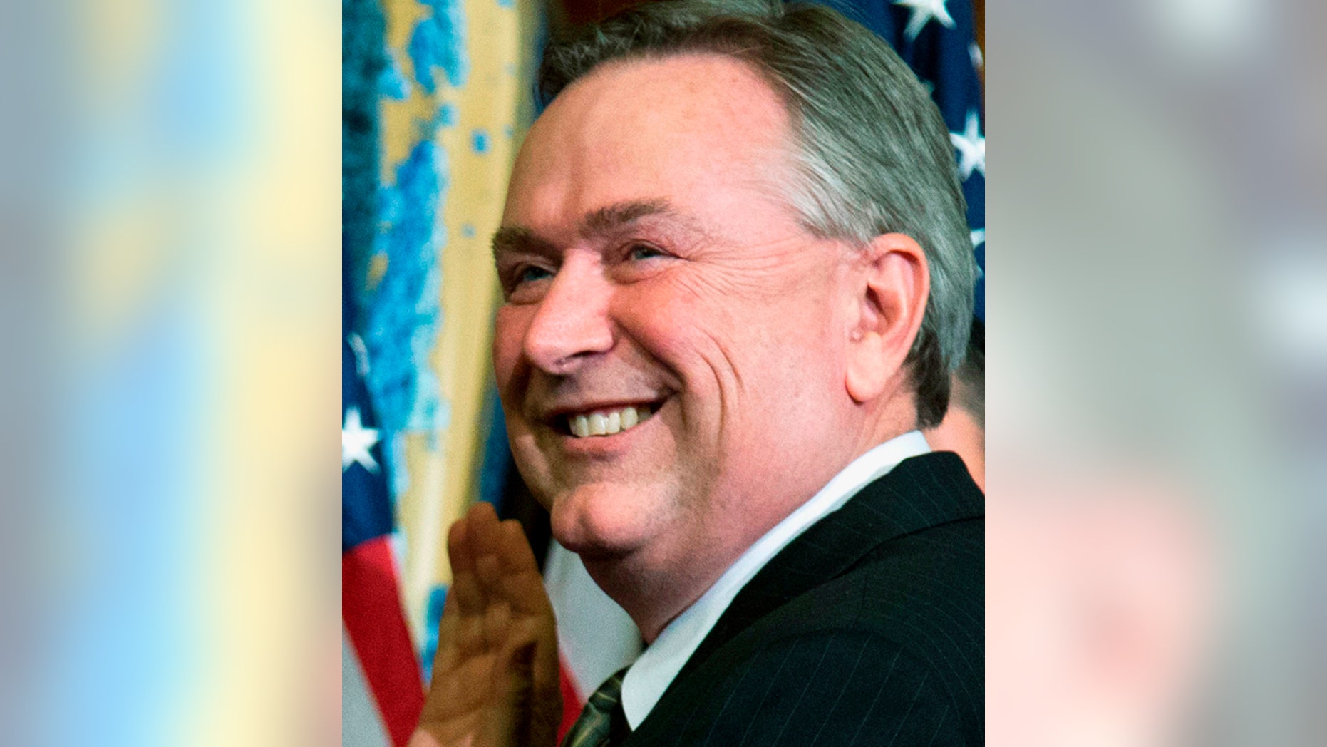 In this Jan. 3, 2013, file photo, Rep. Steve Stockman, R-Texas, right, participates in a mock swearing-in ceremony in Washington.